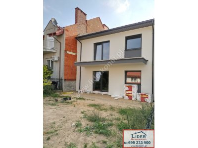 Sprzedam nowy apartament – działka – m. postojowe – Konin, os. Chorzeń